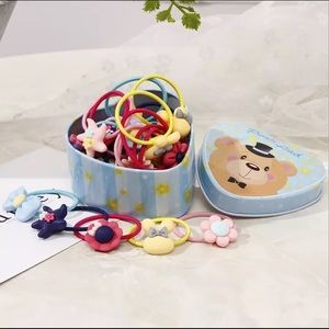20 pcs/box  girl cute cartoon hair ties. 3 for $10